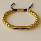 Bracelet perles dorées barre noire – Cordon ajustable | Bracelet mixte