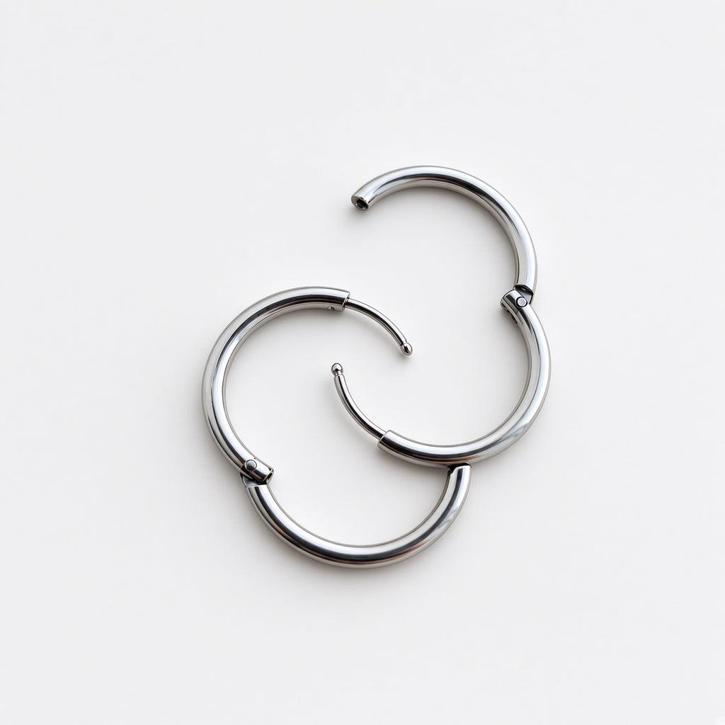 Créoles Argentées Harmonie – Boucles d’Oreilles Créoles Acier Intemporelles