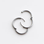 Créoles Argentées Harmonie – Boucles d’Oreilles Créoles Acier Intemporelles
