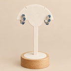 Créoles Argentées Zodiaque Précieux – Boucles d’Oreilles Saphir & Strass