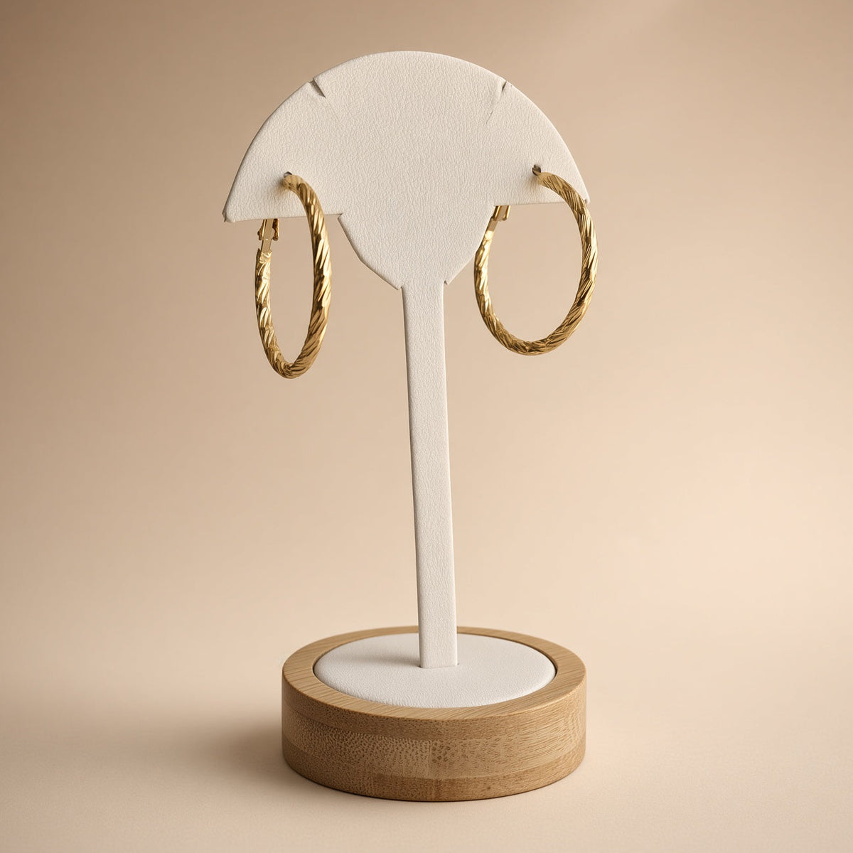 Boucles d'oreilles créoles torsadées – Acier inoxydable plaqué or | Bijoux femme lumineux